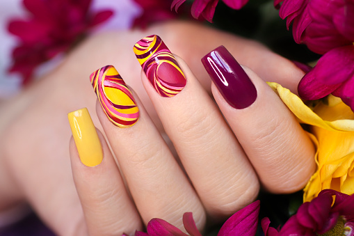 Image of Professional Nail Arts with Maroon & Yellow Colors